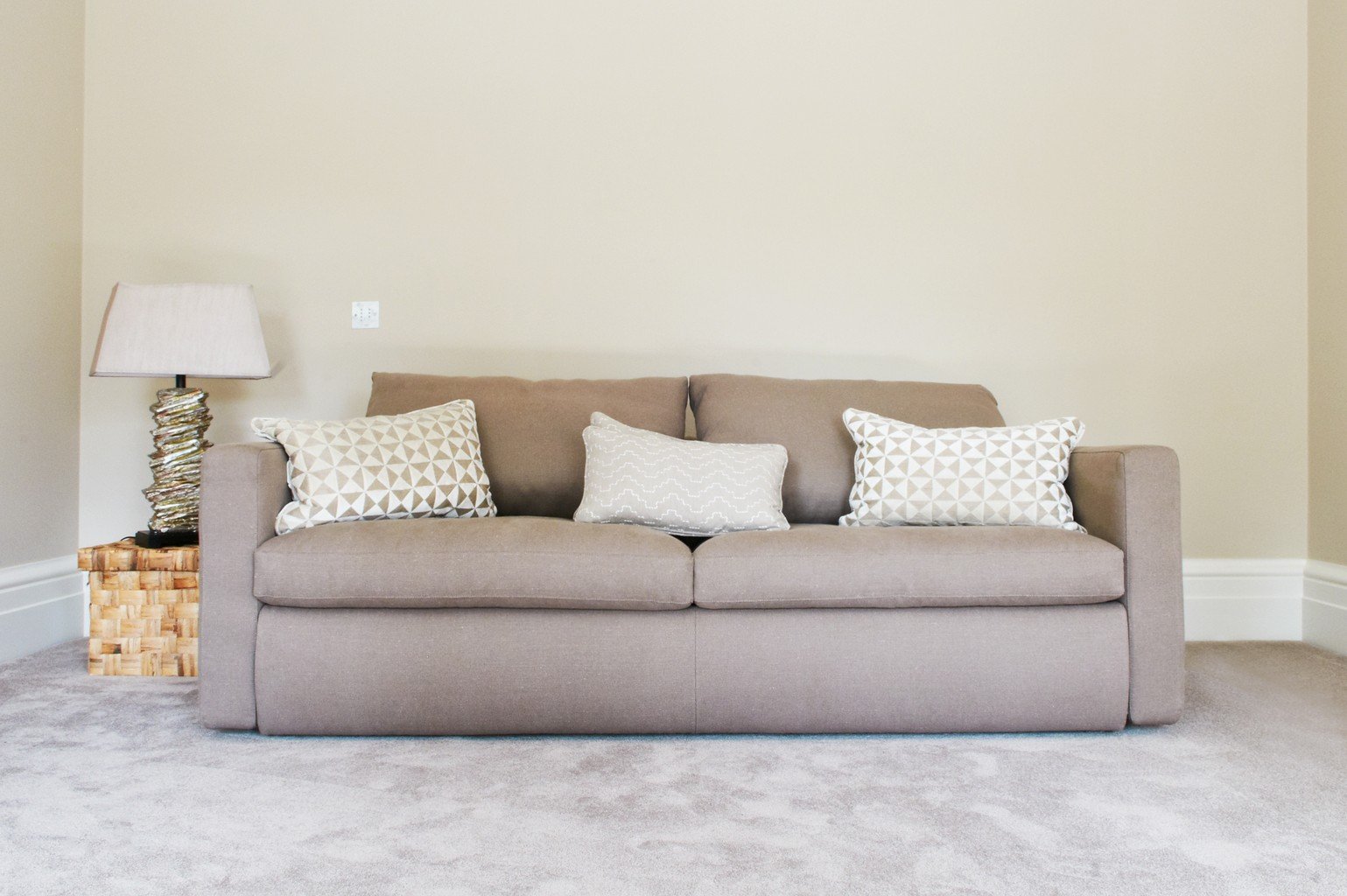 pale grey silk effect luxury carpet and sofa