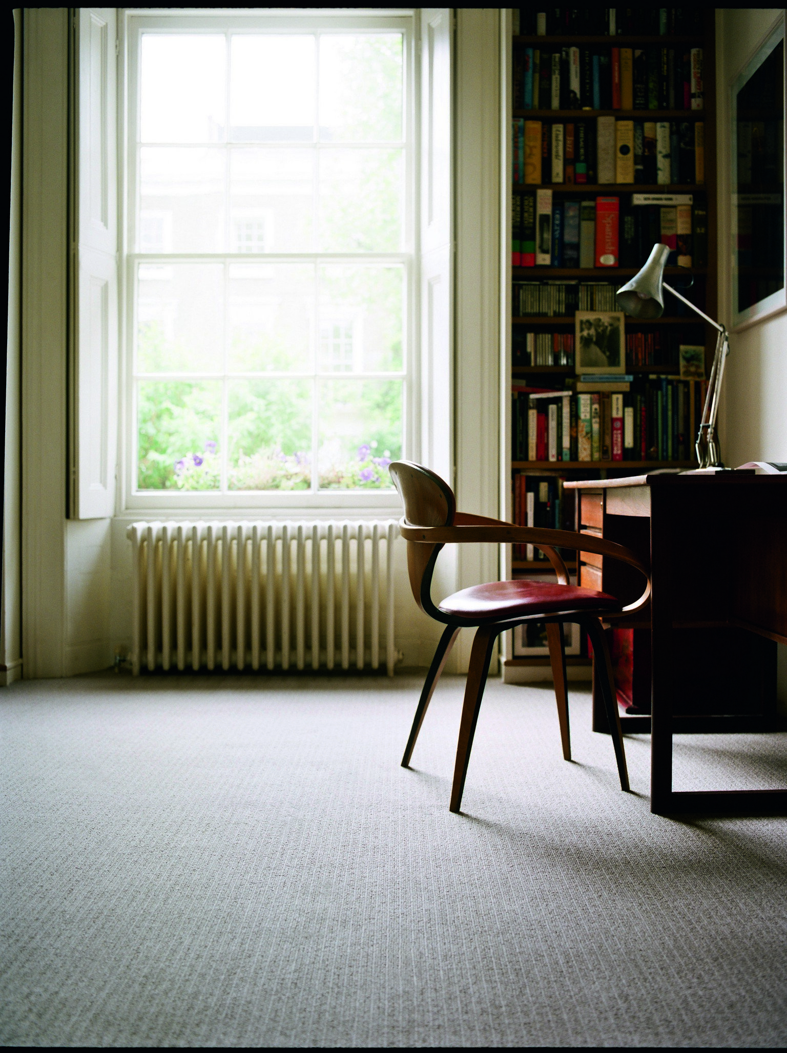 Luxury carpet with modern wood chair