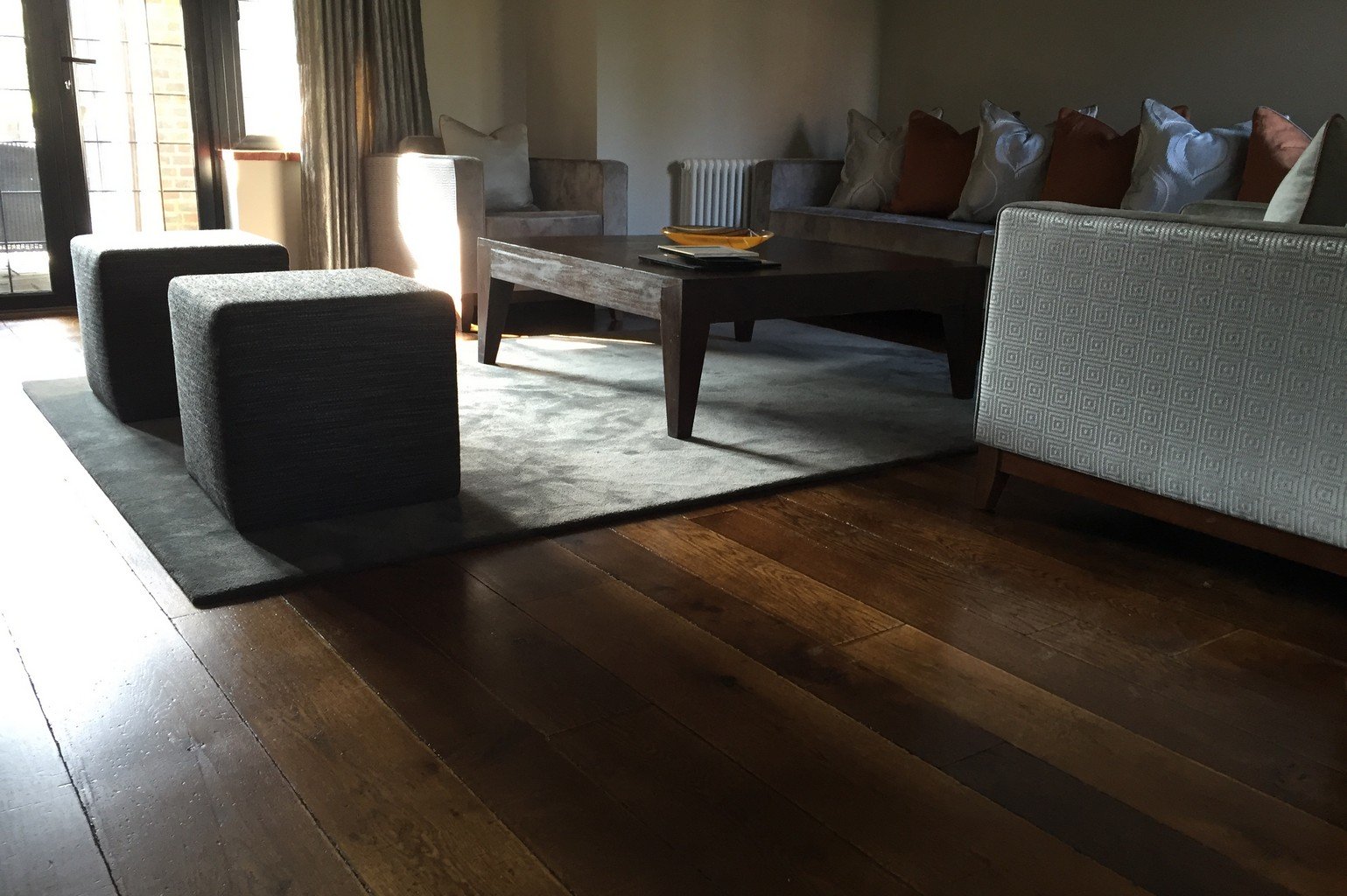 luxury wood flooring and luxury faux silk rug