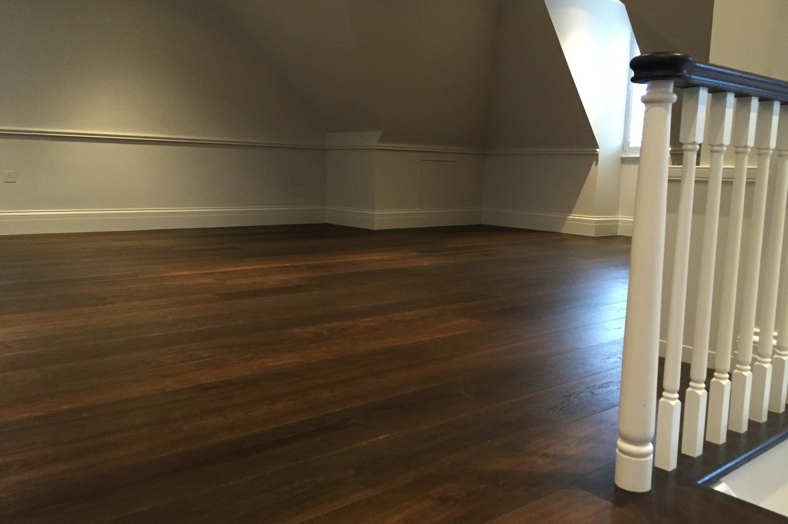 luxury wood flooring and bannister