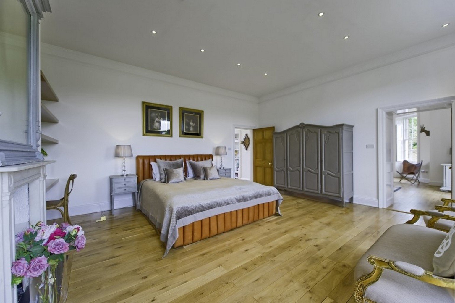 luxury wood flooring in spacious bedroom